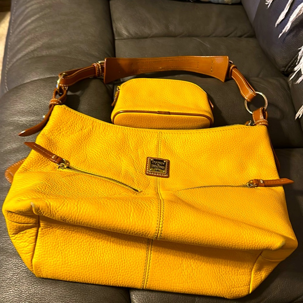 Dooney original. Rich Pebbled leather.in the beautiful mustard fall color.